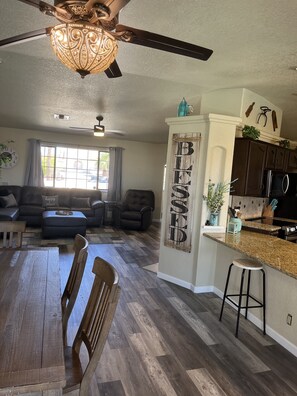 Smart TV, fireplace, books, stereo