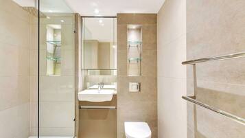 Combined shower/bathtub, hair dryer, towels, toilet paper