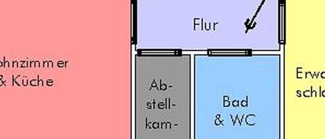 A hotel layout with a living room & kitchen area, a bathroom, a bedroom, and a bathroom with WC.