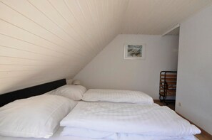 2 chambres, coffres-forts dans les chambres, fer et planche à repasser