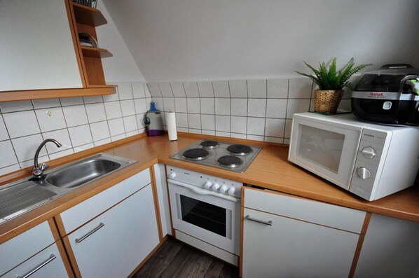 Unclassified image, 1 of 15, button