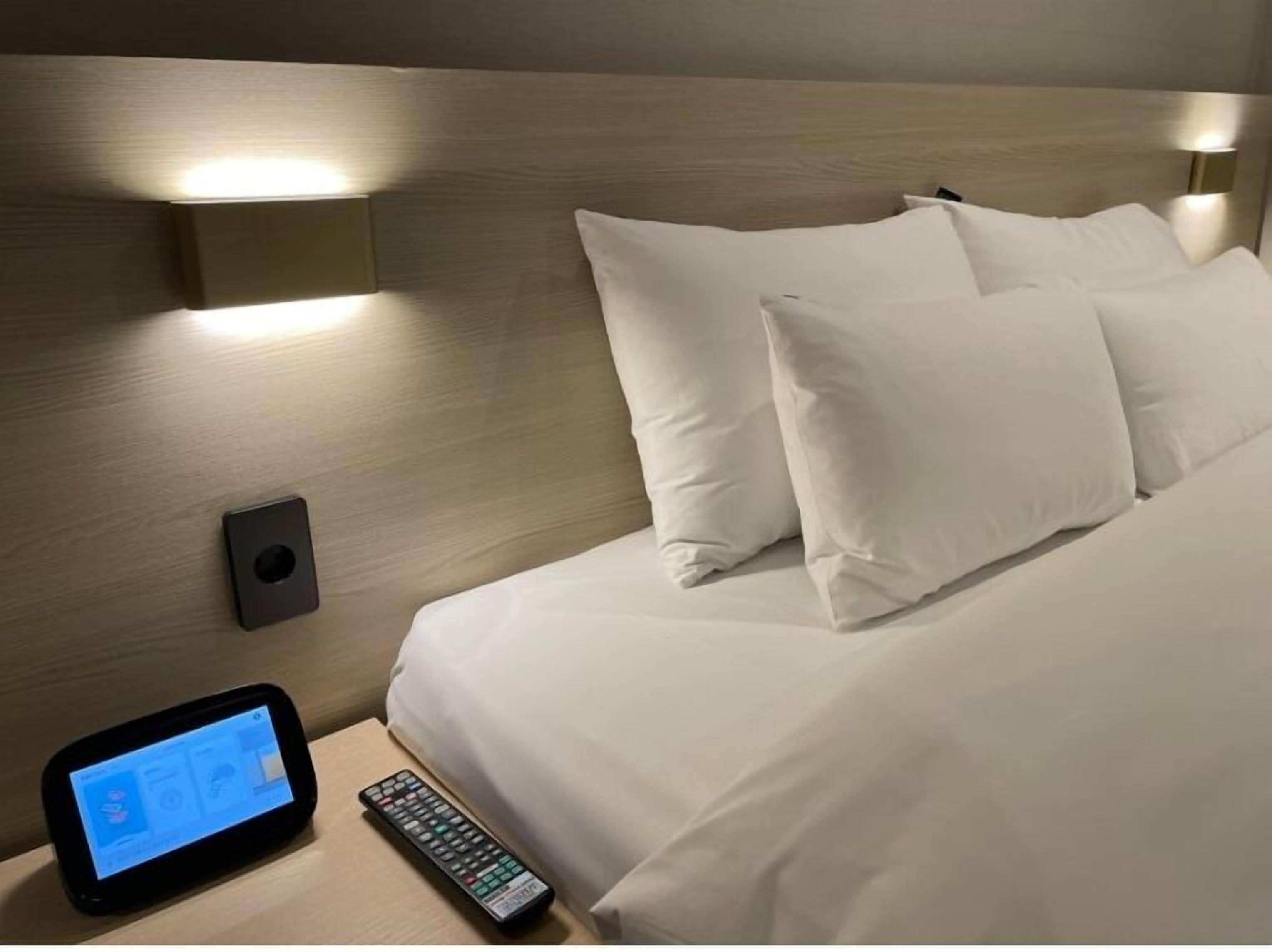 deluxe double room | premium bedding, down duvets, desk, laptop workspace