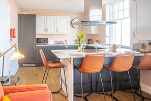 Microwave, dishwasher, coffee/tea maker, high chair