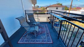 Chambre, 1 très grand lit | Terrasse/Patio