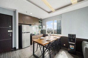 Apartment, 3 Bedrooms | Dining room - PECAN by Kozystay (Jakarta)