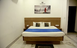 Habitación Deluxe | Ropa de cama de alta calidad, insonorización y wifi gratis 