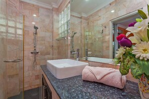 Combined shower/tub, towels, soap, toilet paper