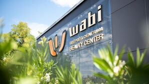 A building with a large sign reading "Wabi Beauty Center." - Wabi Hotel - Beauty & Dental Center (Sopron)