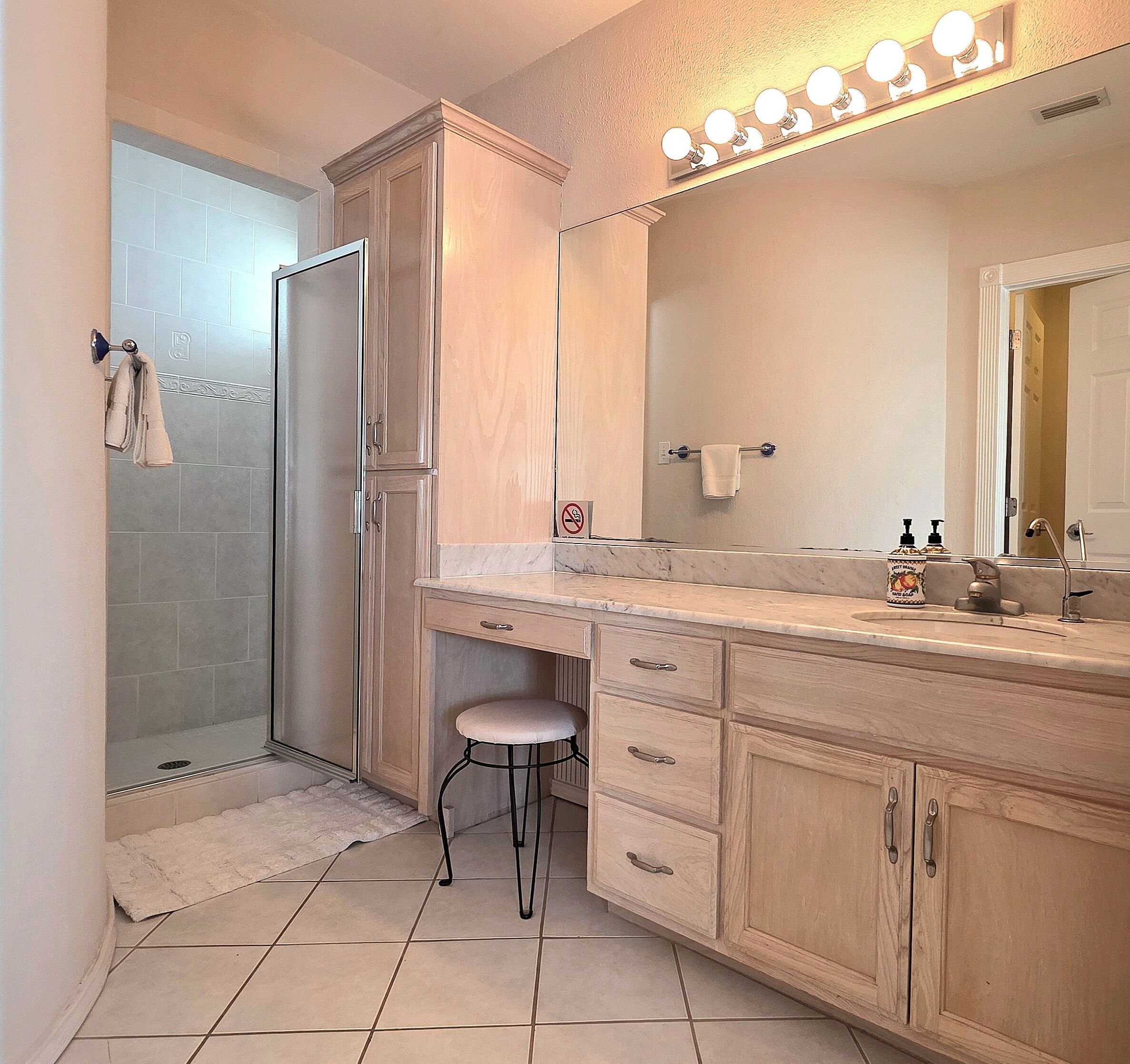 Shower, jetted tub, towels, soap