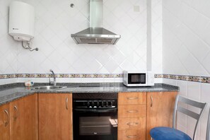 Frigorífic, microones, forn i placa de cuina 
