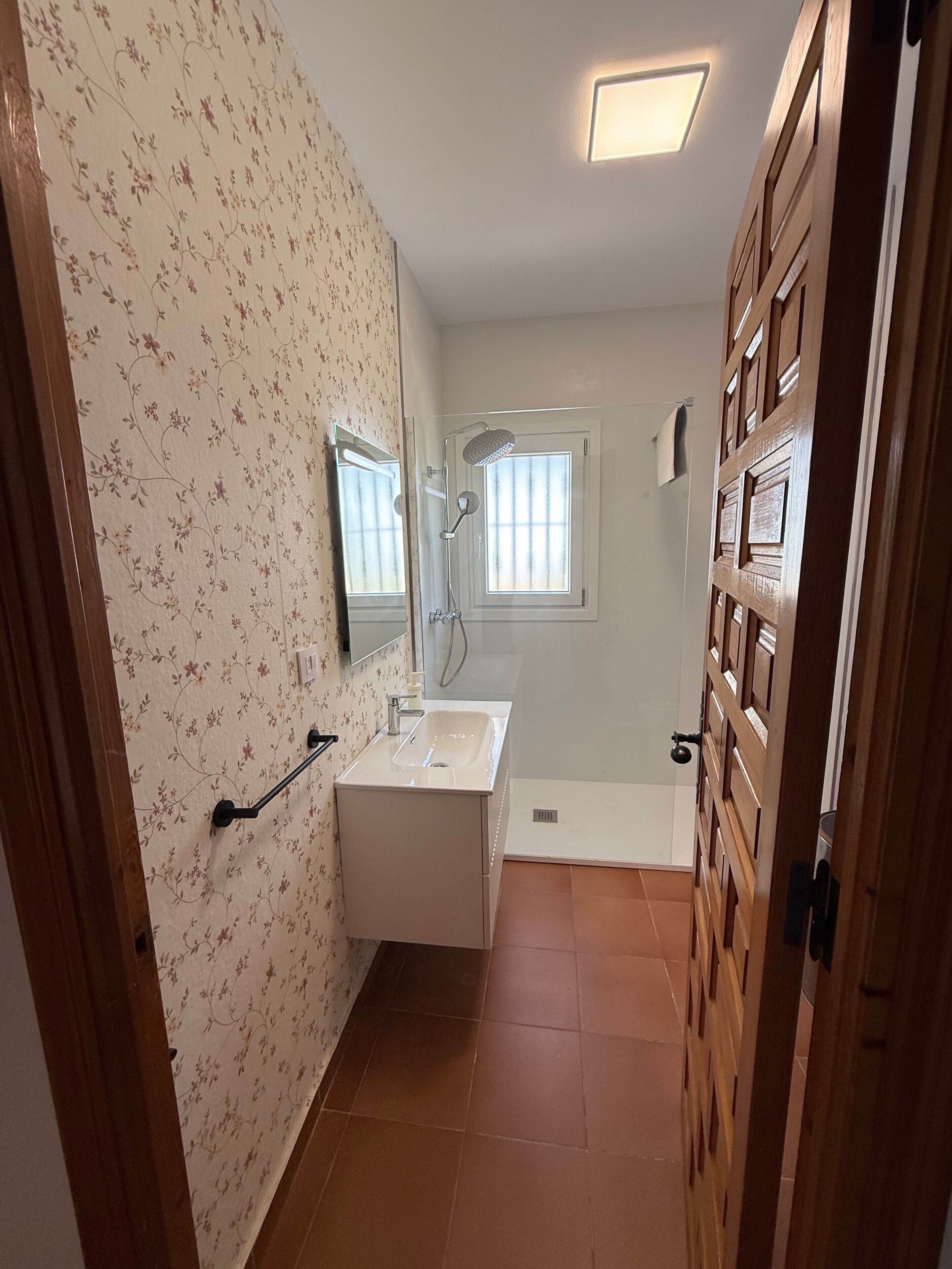 Bathtub, hair dryer, towels