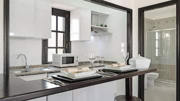 Fridge, microwave, stovetop, coffee/tea maker