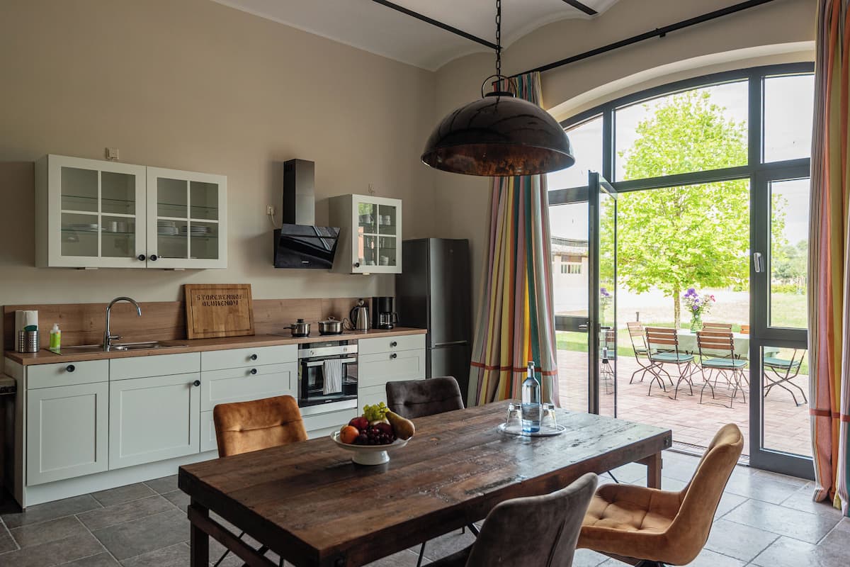 Condo | Living room | 42-inch flat-screen TV with satellite channels, TV, heated floors