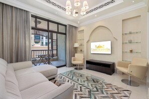 Luxury Apartment | Living area | 55-inch Smart TV with digital channels, TV, Netflix - Lux BnB I Souk Al Bahar I Burj Khalifa Views (Dubai)