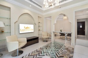 Luxury Apartment | Living area | 55-inch Smart TV with digital channels, TV, Netflix - Lux BnB I Souk Al Bahar I Burj Khalifa Views (Dubai)