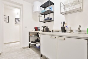 Fridge, microwave, stovetop, cookware/dishes/utensils