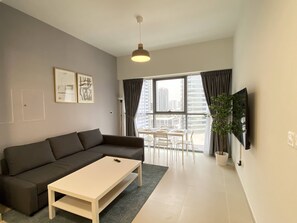 Appartement Premier | Aire de séjour | Téléviseur connecté, Netflix, services de diffusion en continu
