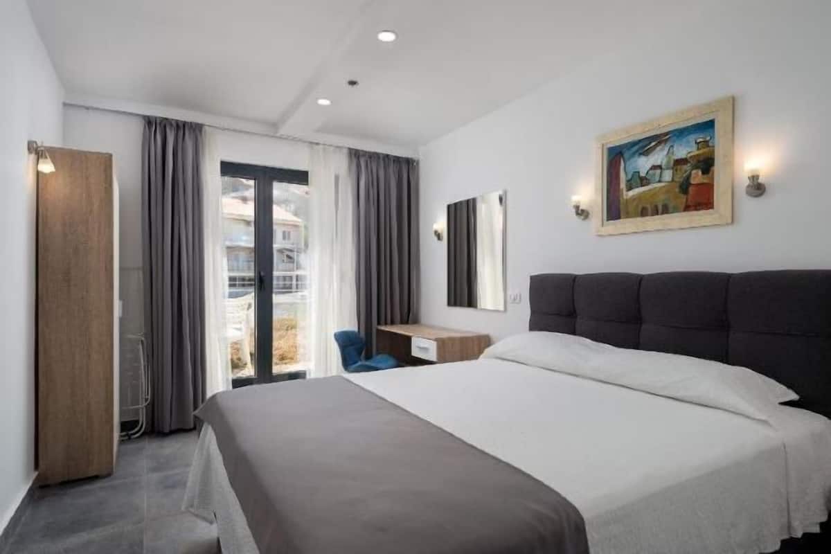 In-room safe, desk, laptop workspace, blackout curtains