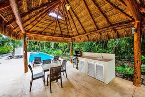 Outdoor dining - Stylish Jungle Condo, Walking Distance to Beach (Akumal)
