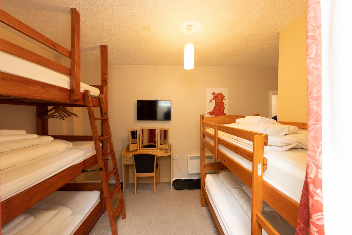 Family Room | Desk, iron/ironing board, free WiFi, bed sheets
