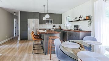 Coffee/tea maker, fridge, microwave, oven