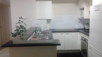 Fridge, microwave, oven, electric kettle