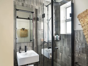 Shower, hair dryer, towels, shampoo