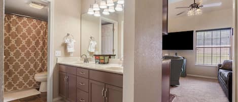 Condo, Multiple Beds, Balcony, Garden View (Journey Down Abby Lane ) | Bathroom | Combined shower/bathtub, hair dryer, towels