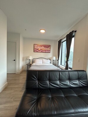 1 habitación, tabla de planchar con plancha, wifi gratis y ropa de cama 