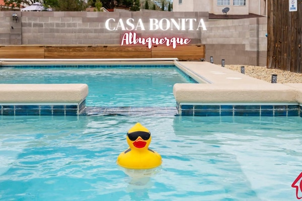 INCREDIBLE RESORT STYLE HEATED POOL AND HOT TUB OPEN YEAR-ROUND!