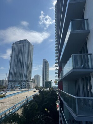 Enjoy stunning city views from the spacious balcony of this high-rise residence.