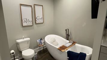 Combined shower/tub, hair dryer, towels, toilet paper