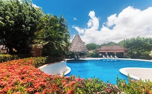 Outdoor pool, a heated pool - Los Sueños Impeccable, Spacious 2+2 Condo (Herradura)