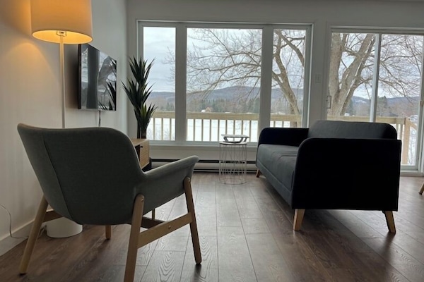 Condo | Living area | 40-inch flat-screen TV with cable channels, fireplace