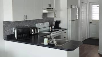 Condo | Private kitchen | Full-size fridge, microwave, oven, stovetop