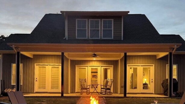 A house with a fire pit in the backyard, surrounded by chairs and a covered patio area. - New Country Cottage, 3BR 2.5 BA, Ensuite Master on Main, Relax Rewind Repeat (High Point)