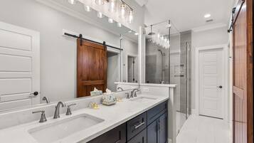 Combined shower/tub, hair dryer, towels, soap