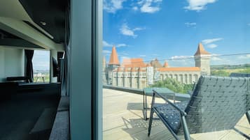 Premium Studio Suite, Balcony, City View | Minibar, in-room safe, desk, laptop workspace