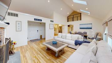 Smart TV, fireplace, books