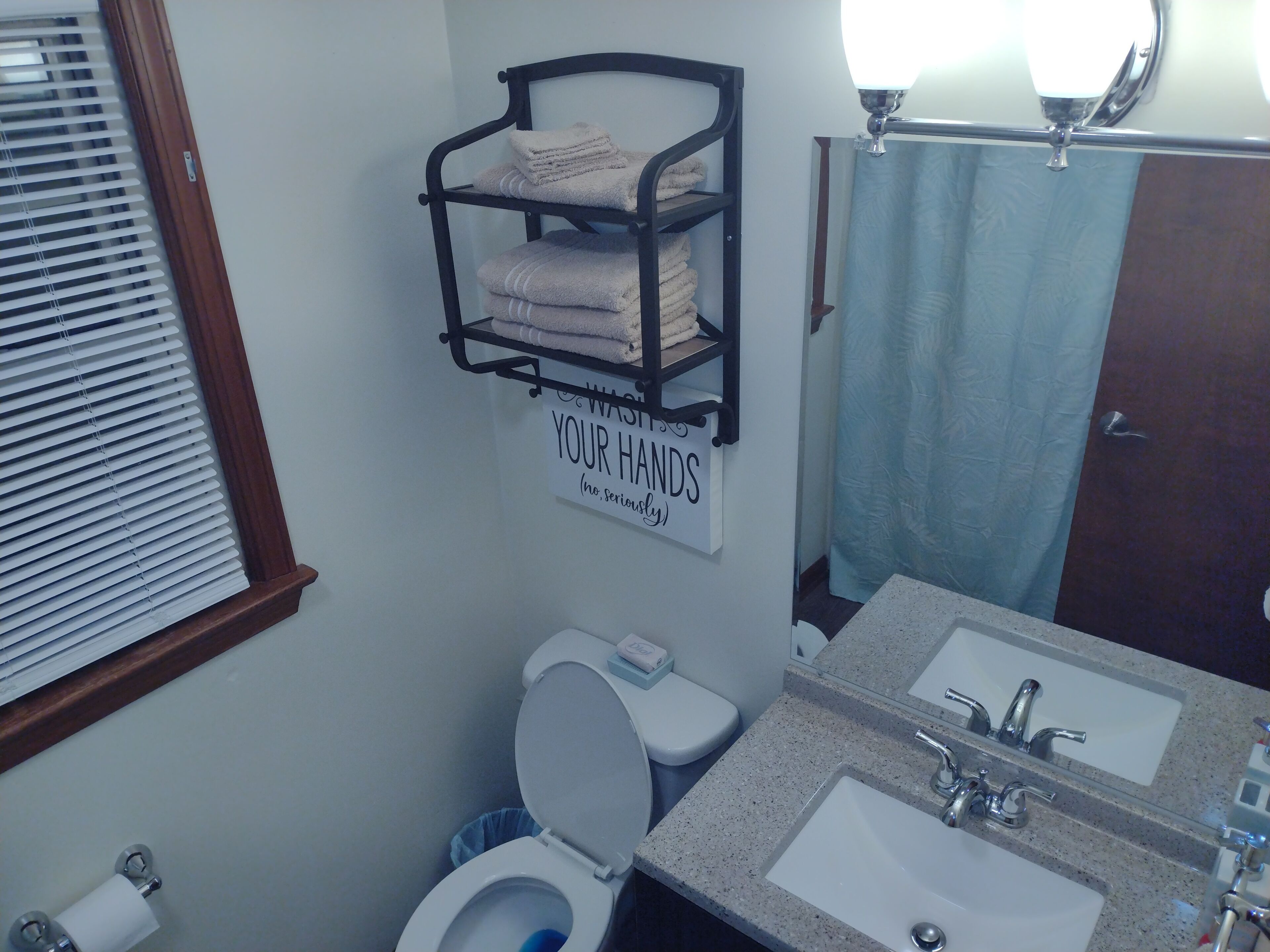 Combined shower/tub, hair dryer, towels, soap