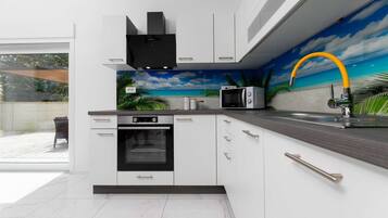 Réfrigérateur, four, lave-vaisselle, cafetiÚre/bouilloire