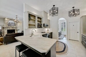 Fridge, microwave, oven, stovetop - Stunning 5-Bedroom Home with Pool and Bar - Sleeps 14 & Pet Friendly! (Dripping Springs)