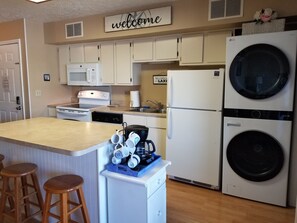 Coffee/tea maker, fridge, microwave, oven