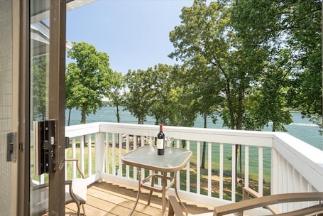 Outdoor dining. Lakefront Retreat at Smith Mountain Lake. Covered Boat Slip + Kayaks