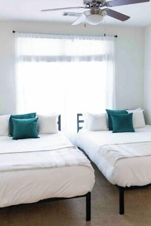 2 bedrooms, desk, iron/ironing board, travel crib