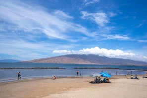On the beach, sun loungers, beach towels