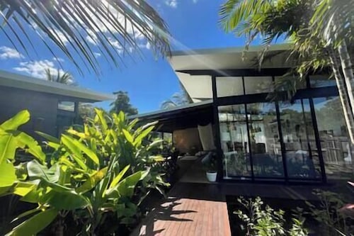 Tropical Modernist Retreat is set up as a contemporary beach abode