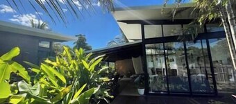 Tropical Modernist Retreat is set up as a contemporary beach abode