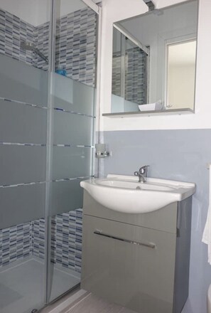 Shower, bidet, toilet paper