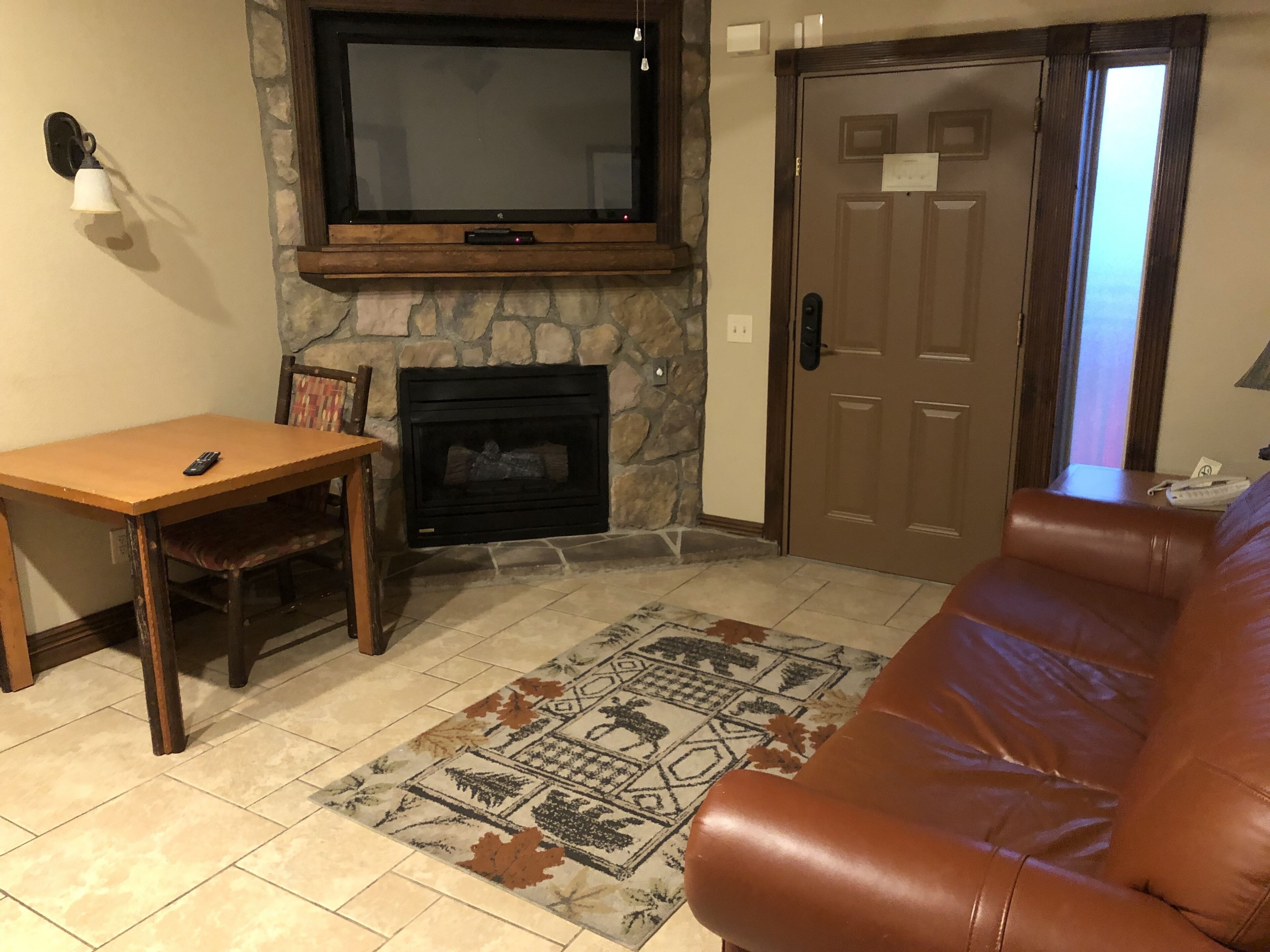 Flat-screen TV, fireplace